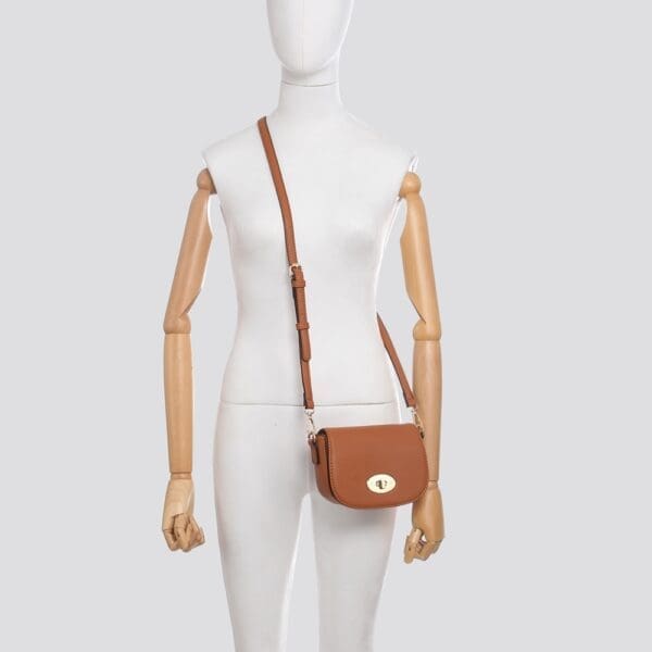 A mannequin with an Import placeholder for 11368 cross body bag.