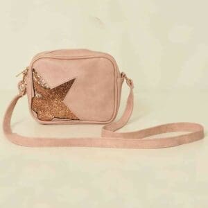 A pink cross body bag with a star on it. (Import placeholder for 10057)