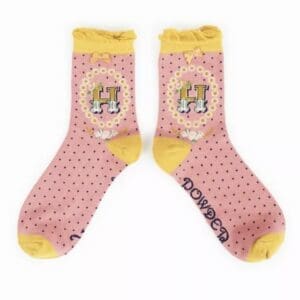 A pair of Import placeholder for 7032 socks with polka dots.
