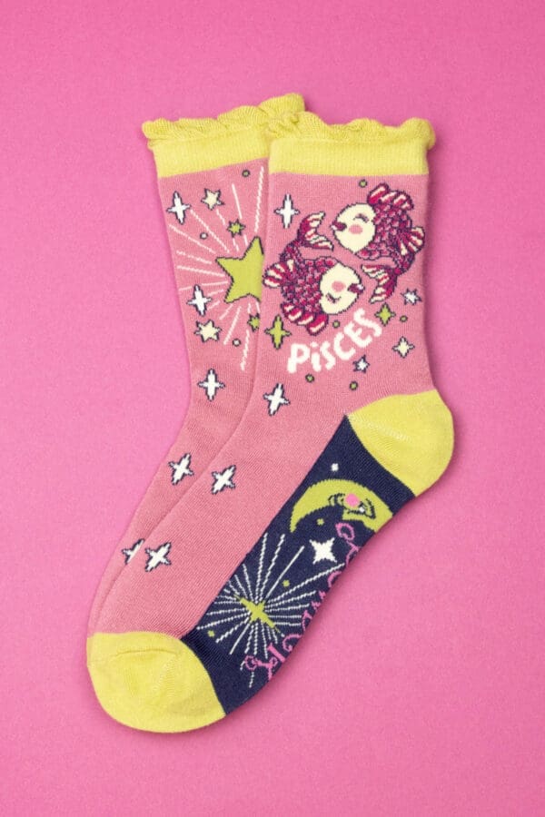 A pair of pink socks with stars on them for Import placeholder 10313.
