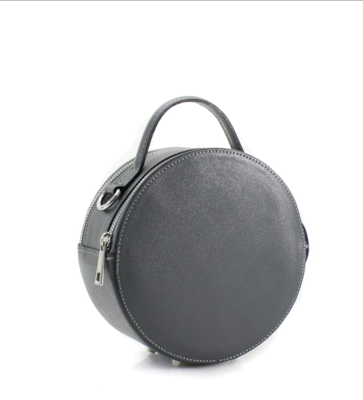 A round black leather bag on a white background.