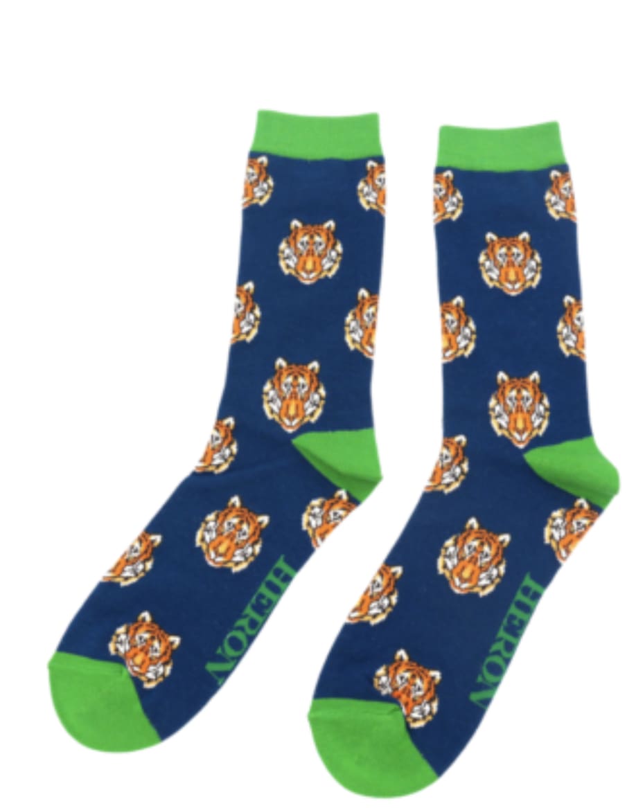 A pair of blue and green socks with tigers on them.