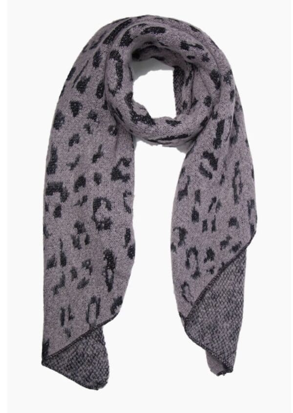 A grey and black leopard print scarf on a white background.
