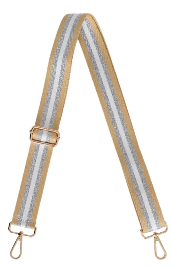A gold and white strap with a gold and white stripe.