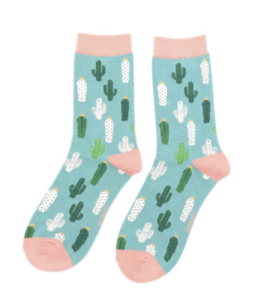 A pair of socks with cactus designs.